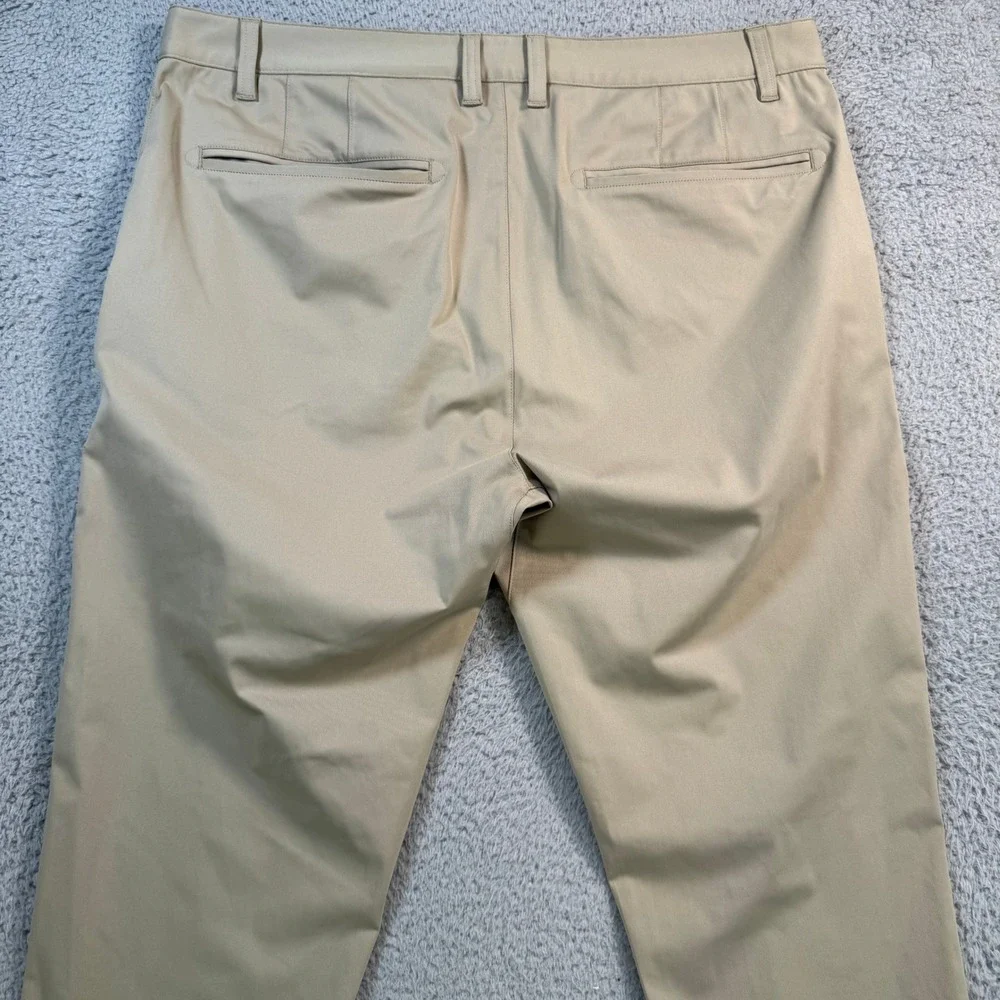 Rhone Commuter Pants Mens 36x27 Khaki Performance Stretch Slim Straight Chino